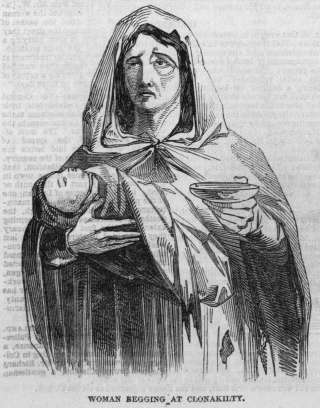 irish famine a woman with child begging
